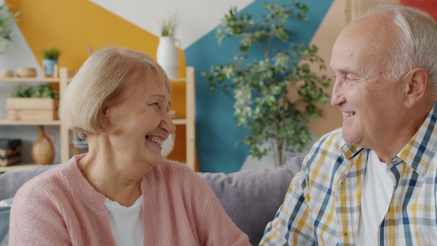 An older couple, warm and at peace in each other's company.